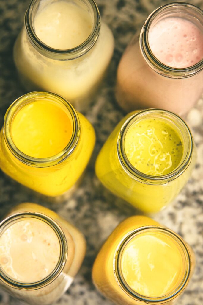 Glass bottles of Butta cultured milk drink lined up and ready for cold storage after bottling